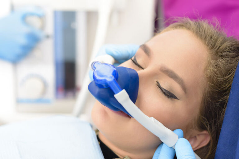 an image of a dental patient using sedation during a dental implant procedure in Louisville, KY.