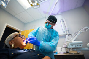 dr. harmon and a dental implant patient during a dental implant procedure.